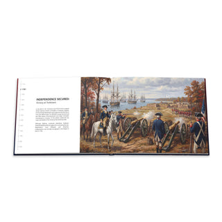 America's 250th Anniversary hardcover coffee table book open to a page depicting a historical battle scene with cannons an...