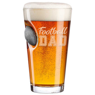 BenShot "Football Dad" glass featuring a football design, filled with amber beer and topped with foam.