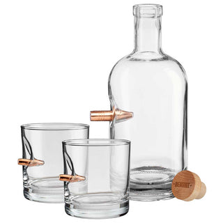 BenShot gift set featuring a glass decanter and two whiskey glasses with bullet designs and a wooden stopper.