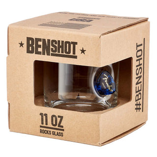BenShot Guitar Pick Glasses in a cardboard box, featuring a blue guitar pick embedded in the glass.