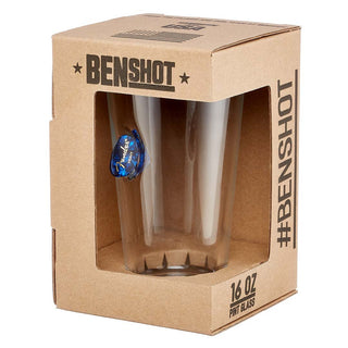 BenShot Guitar Pick Glasses in a clear pint glass with a blue guitar pick embedded, packaged in a brown box.