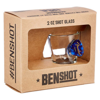 BenShot guitar pick glasses in a clear shot glass, displayed in a brown cardboard box with a window.