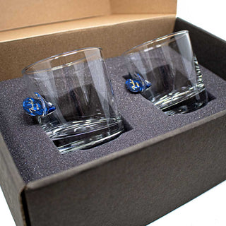 BenShot guitar pick glasses in a gift box with two clear rocks glasses featuring blue guitar pick accents.