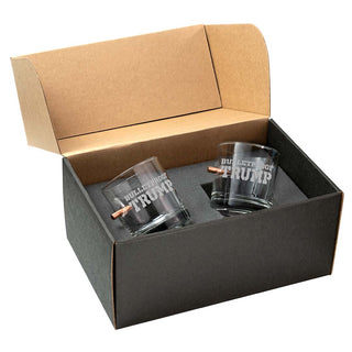 Two Trump whiskey glasses in a black gift box with a brown insert, featuring "Bulletproof Trump" etched on each glass.