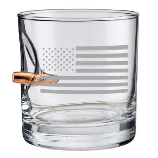 US flag rocks glass, 11oz capacity, featuring an engraved American flag design and a bullet-shaped detail on the side.