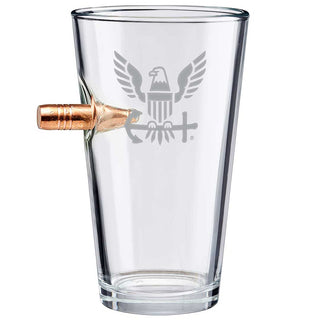 US military glasses featuring a bullet design and eagle emblem, clear glass with a copper-colored bullet handle.