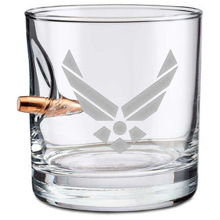 US military glasses featuring a bullet design and engraved air force emblem, clear glass with a sturdy base.